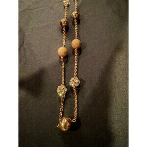 Guess brand rose gold tone necklace with alternating textured embellished beads
